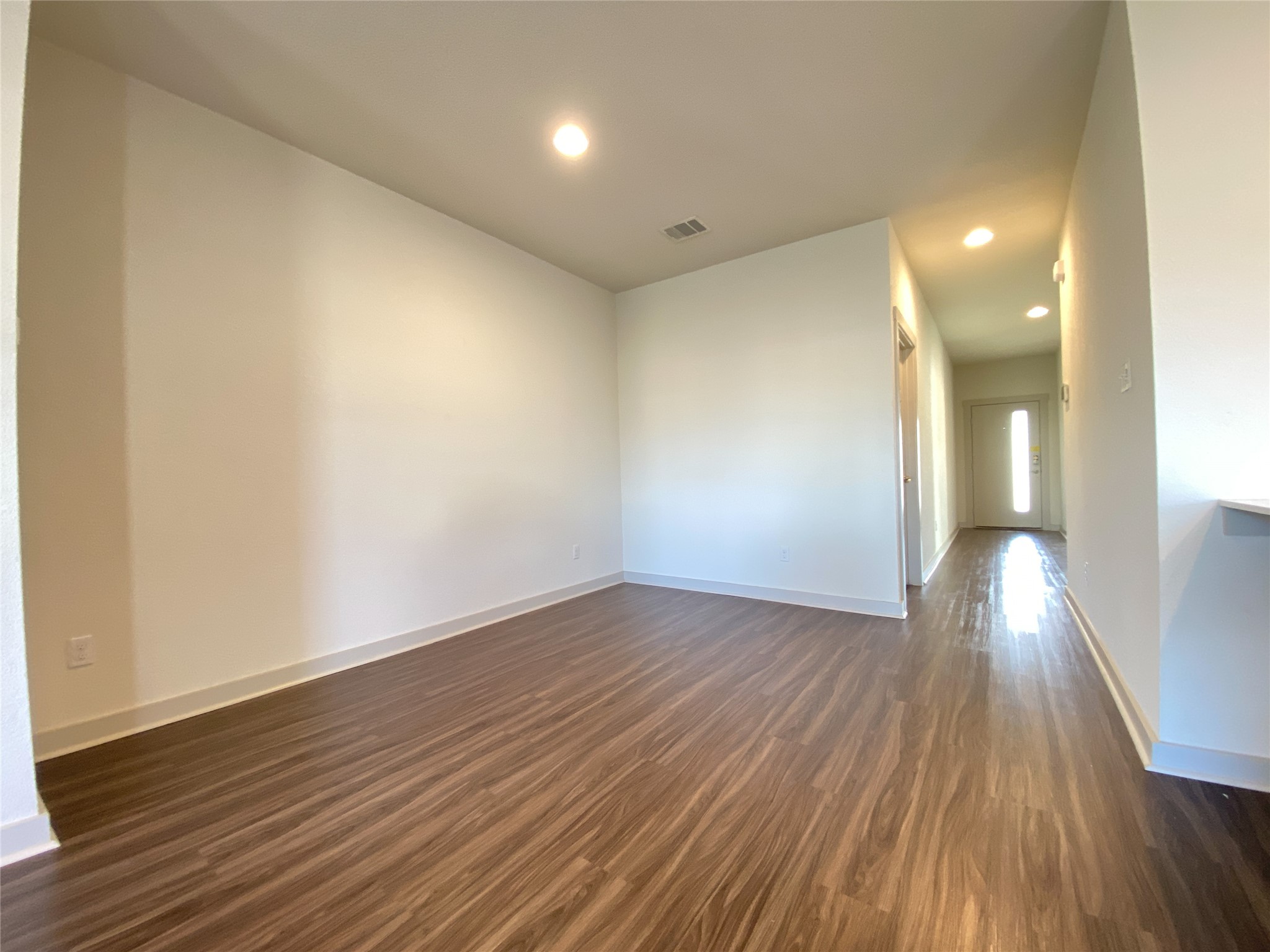 5121 Vanner Path Georgetown, TX 78626 - Photo 10 of 24 a view of an empty room with wooden floor