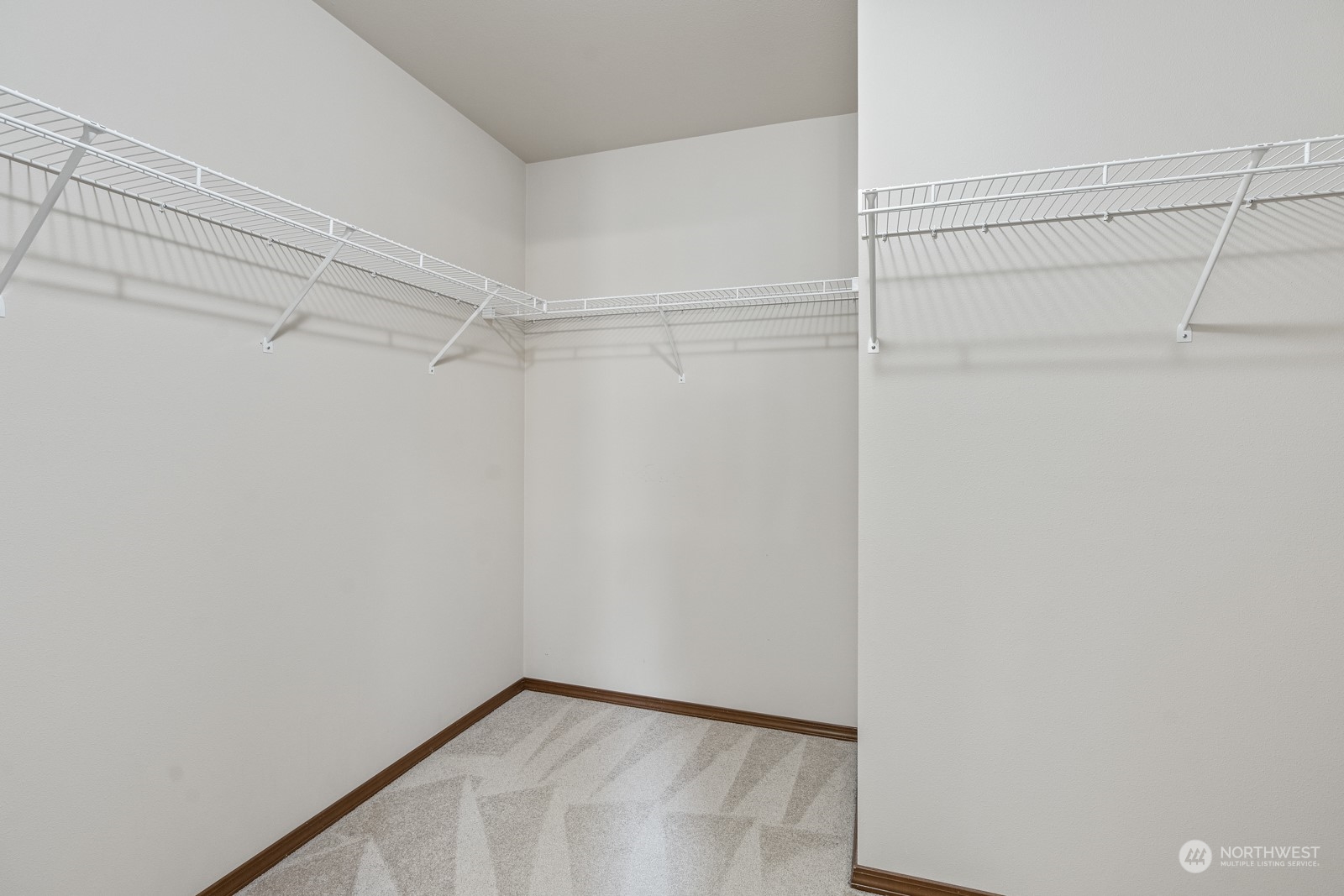 4608 146th Place Southeast Bothell, WA 98012 - Photo 20 of 39 a view of a room with racks on the wall