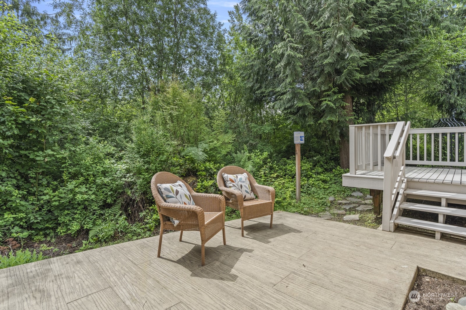 4608 146th Place Southeast Bothell, WA 98012 - Photo 33 of 39 a view of a chair and table in backyard of the house