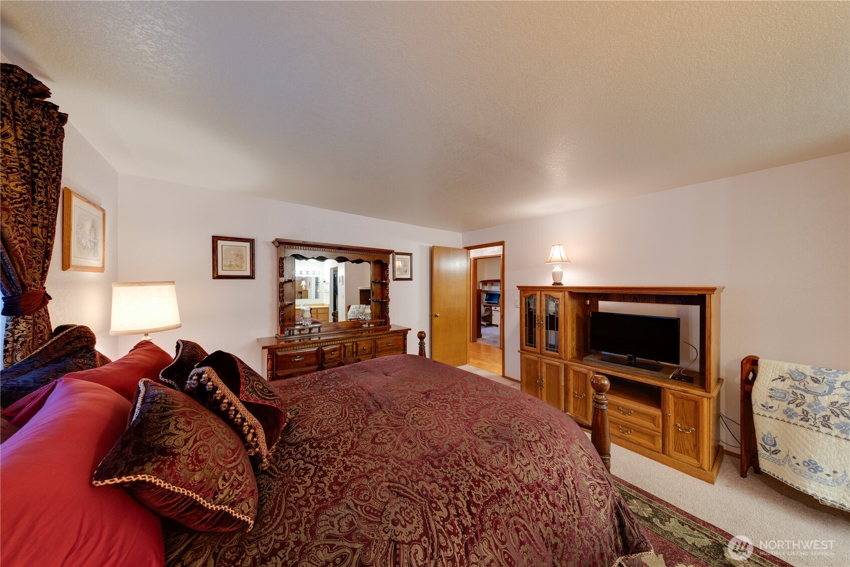 399 Tilingit Place La Conner, WA 98257 - Photo 15 of 39 a living room with furniture and a flat screen tv