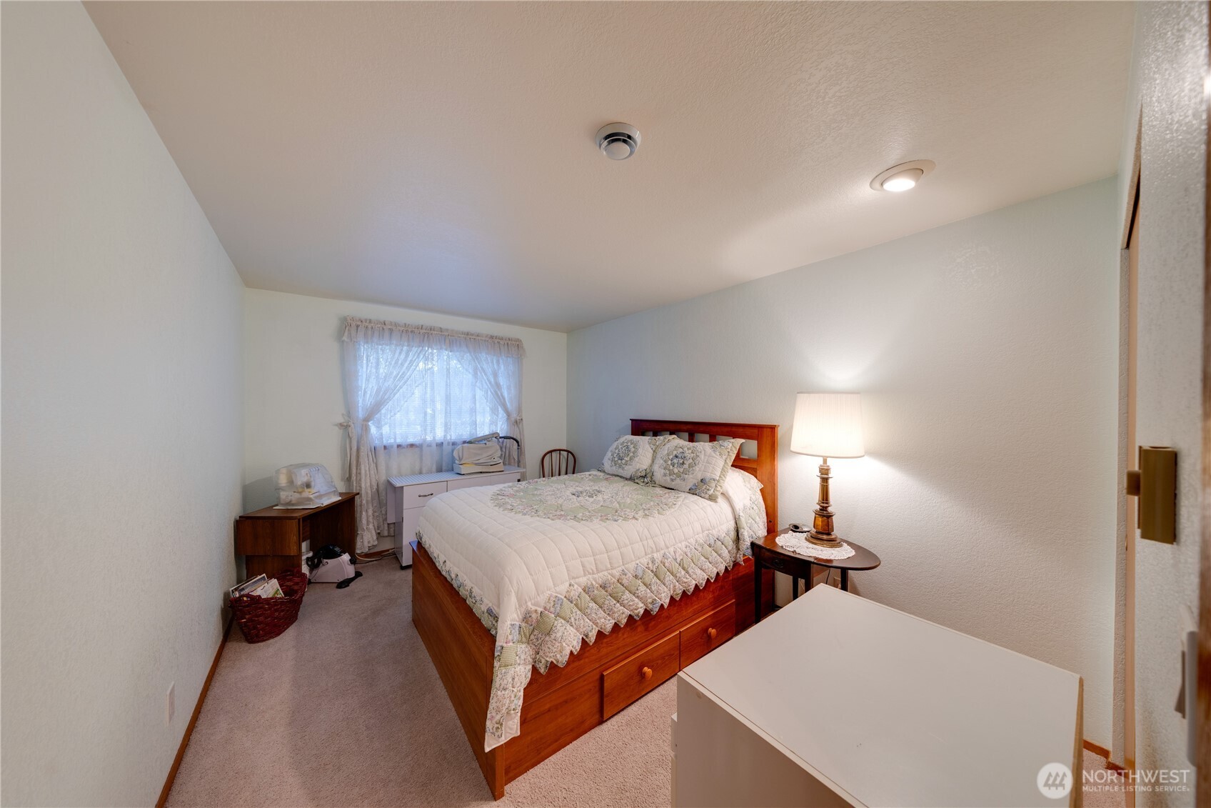 399 Tilingit Place La Conner, WA 98257 - Photo 23 of 39 a bedroom with a bed and window
