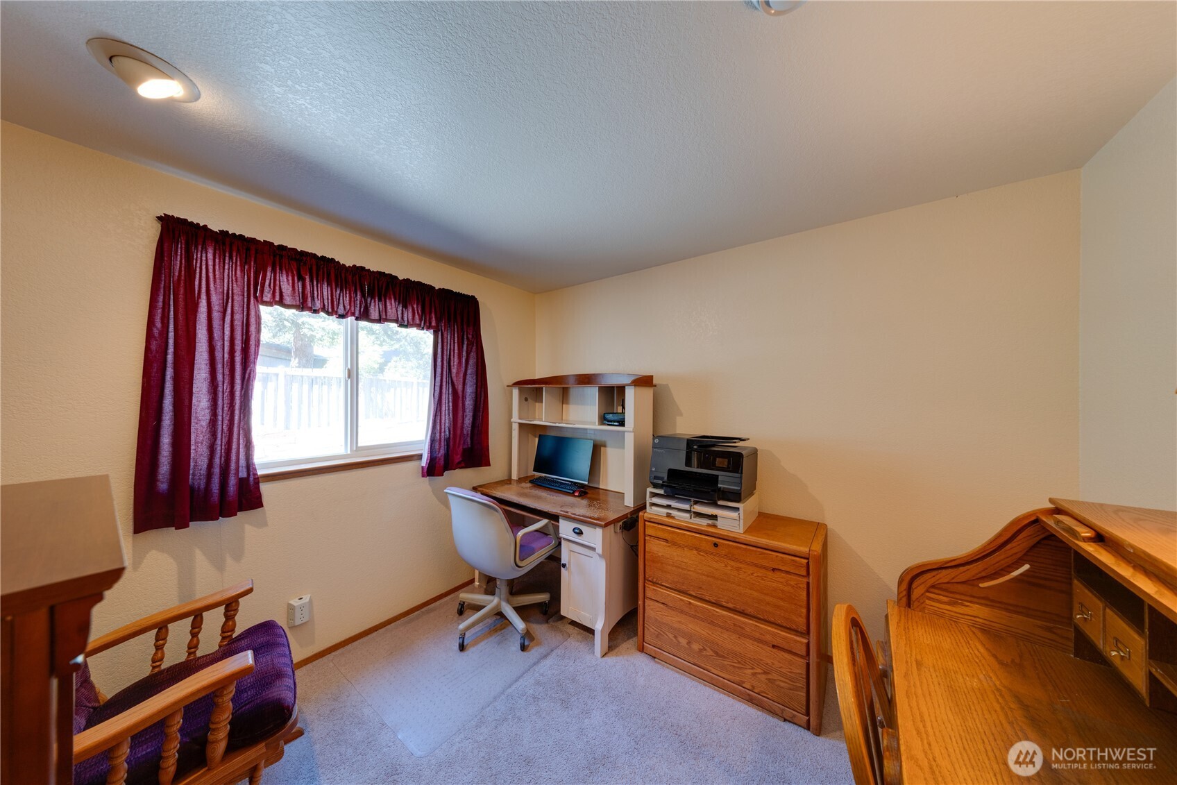 399 Tilingit Place La Conner, WA 98257 - Photo 26 of 39 a view of a workspace with furniture and a window