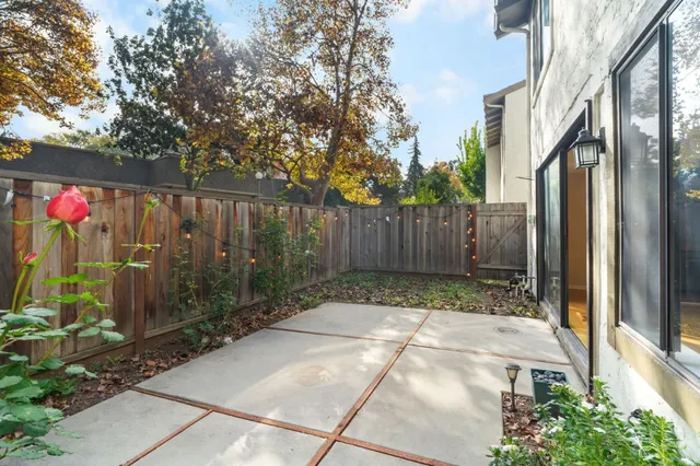 a backyard of a house with trees