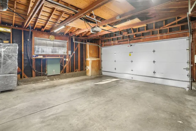 a view of a room with wooden walls