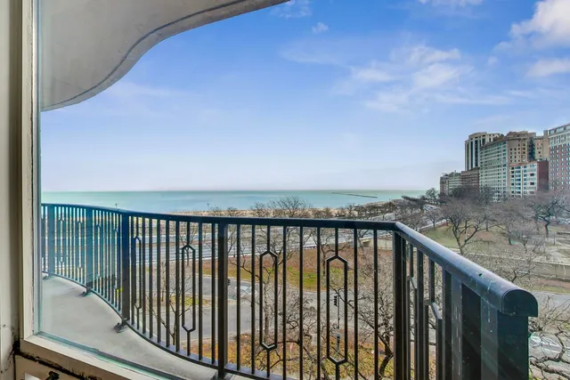 a balcony with a city view