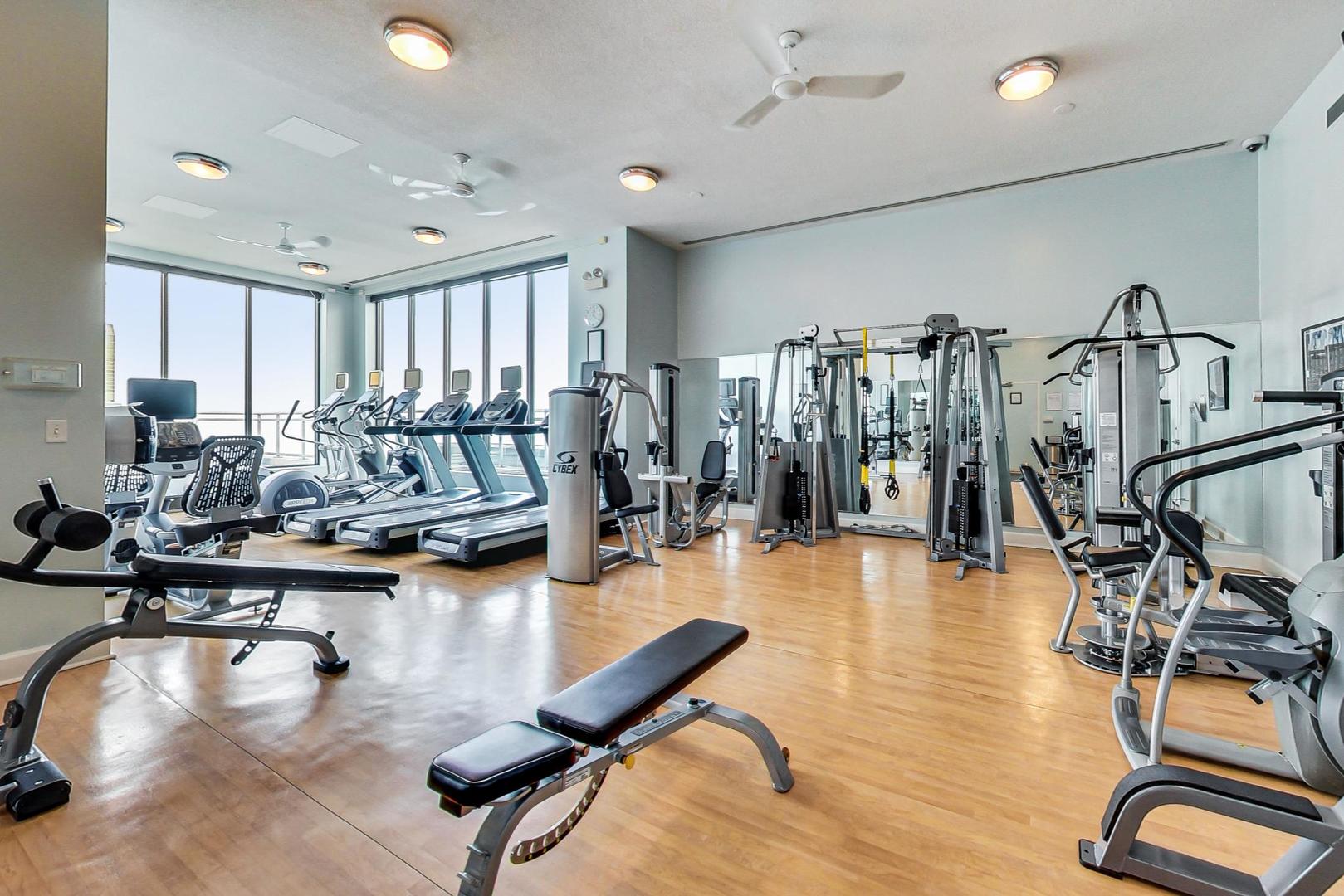 1040 North Lake Shore Drive, Unit 7B Chicago, IL 60611 - Photo 32 of 45 a room with lots of chairs and lots of furniture