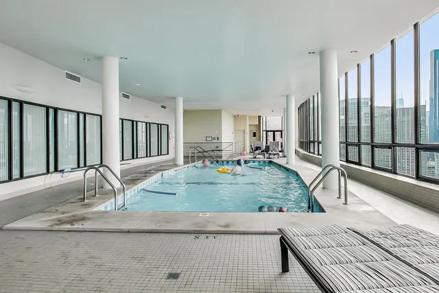 a view of a hall way with kitchen