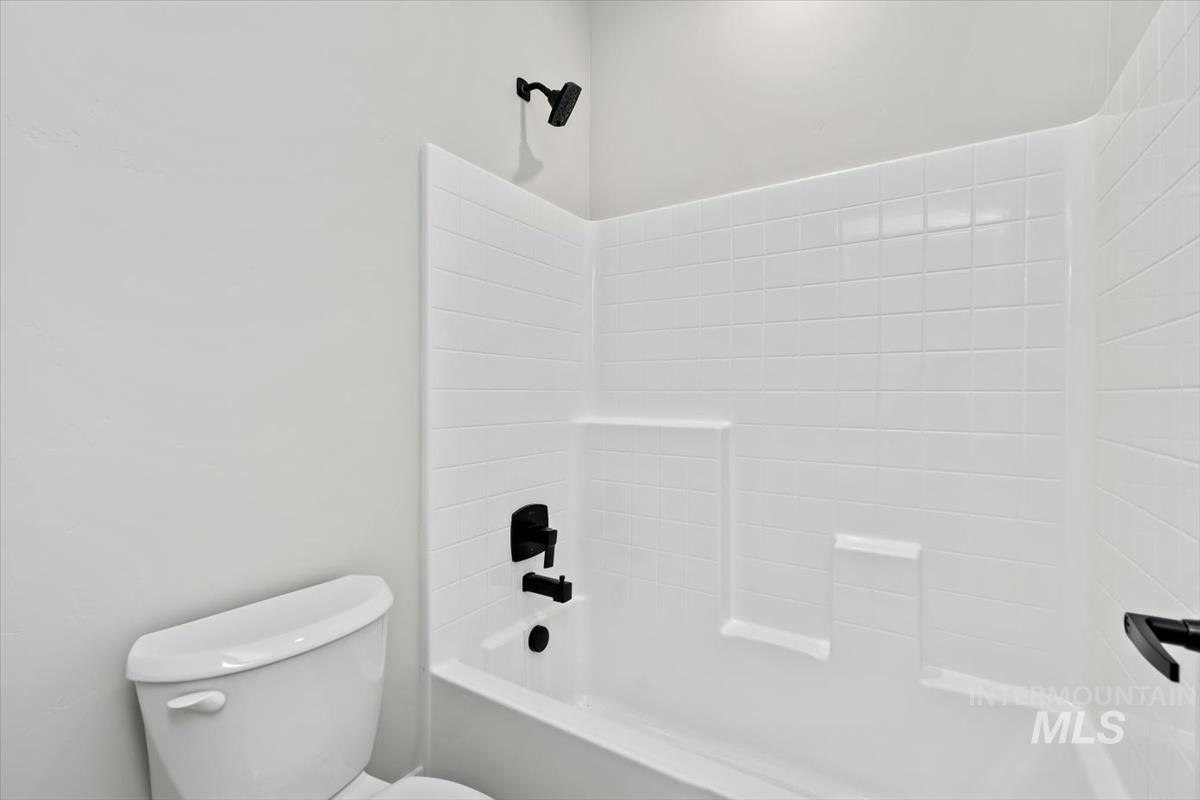 2830 West Jutland Street Meridian, ID 83642 - Photo 34 of 40 Bathroom featuring tub / shower combination and toilet