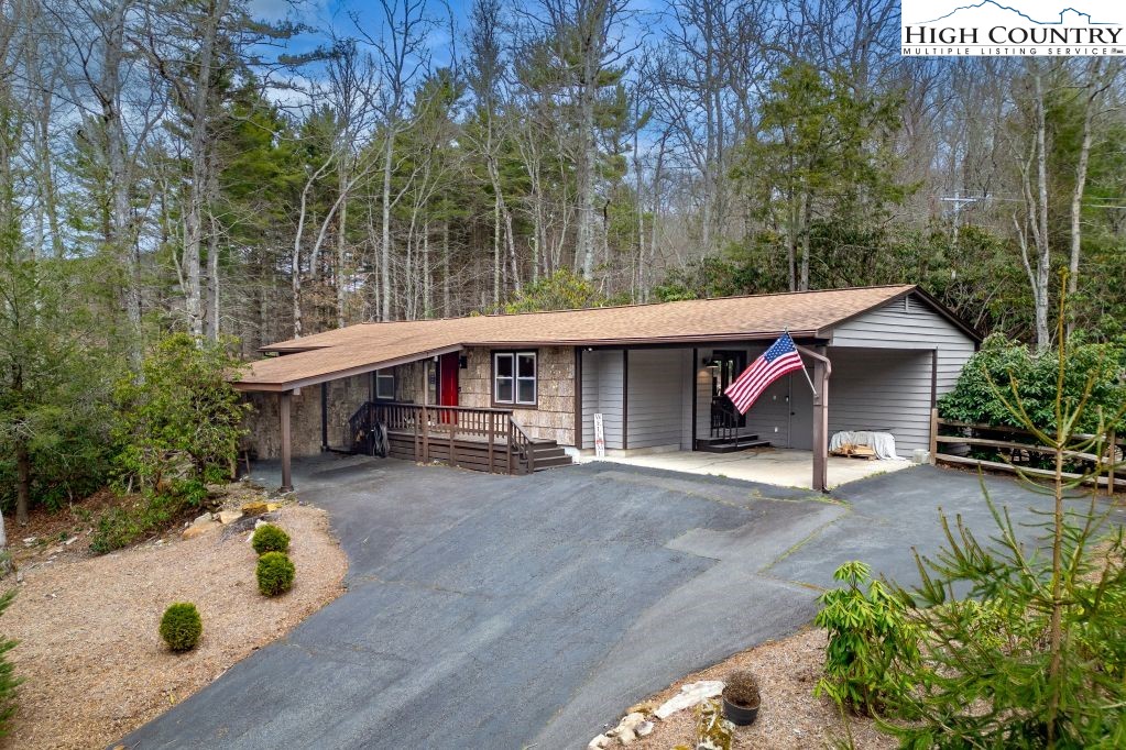 25 Red Oak Road Newland, NC 28657 - Photo 2 of 45 a view of a house with backyard and sitting area
