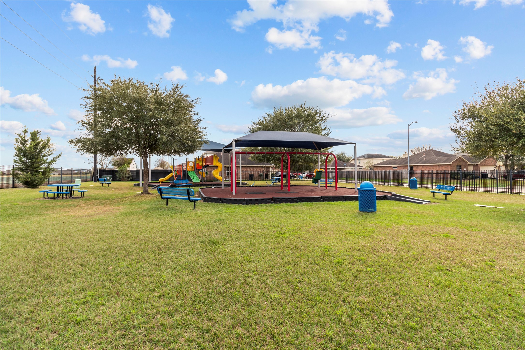 7922 Owl Lane Baytown, TX 77523 - Photo 25 of 25 a view of outdoor space with playground and green space