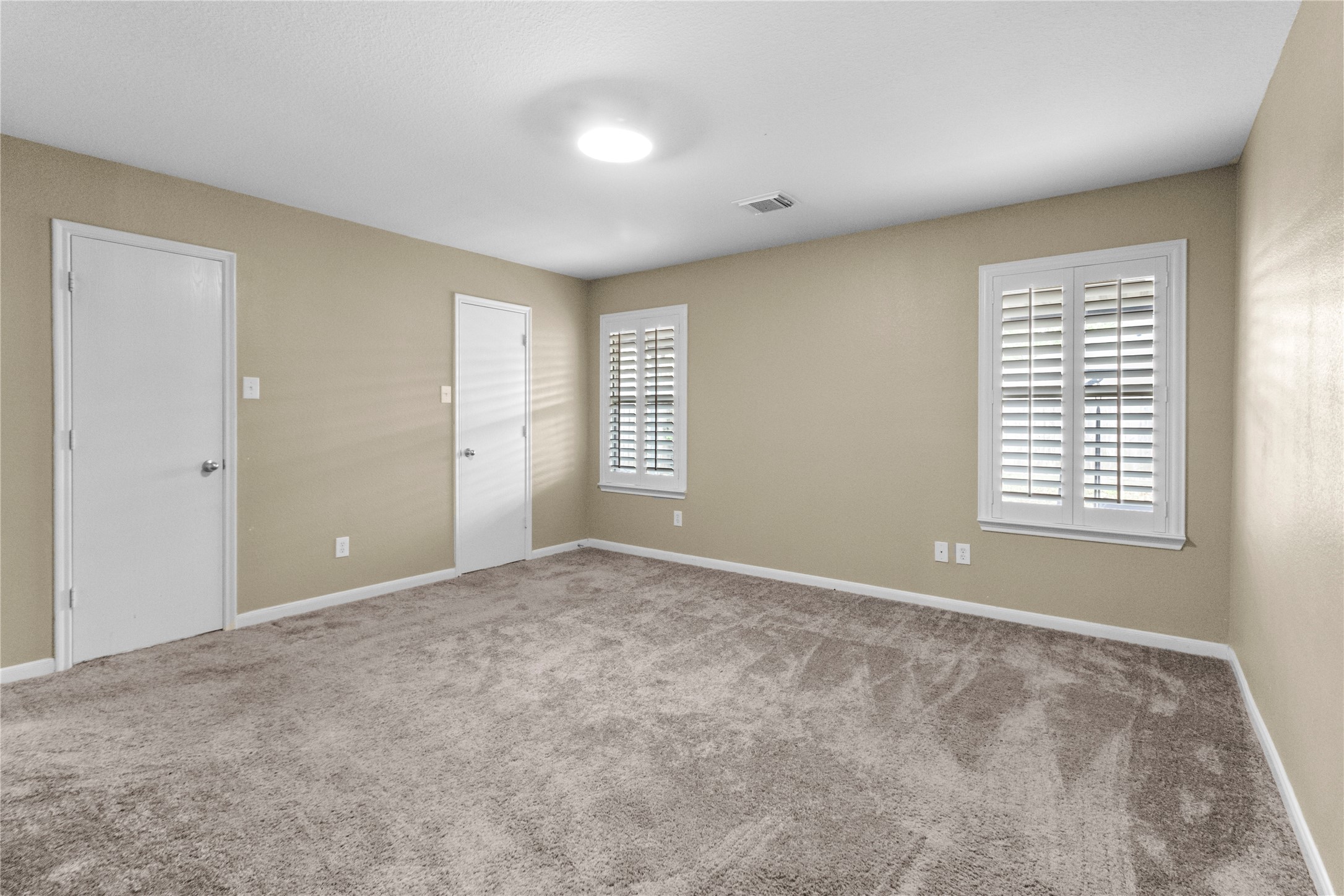 7922 Owl Lane Baytown, TX 77523 - Photo 10 of 25 a view of an empty room with a window