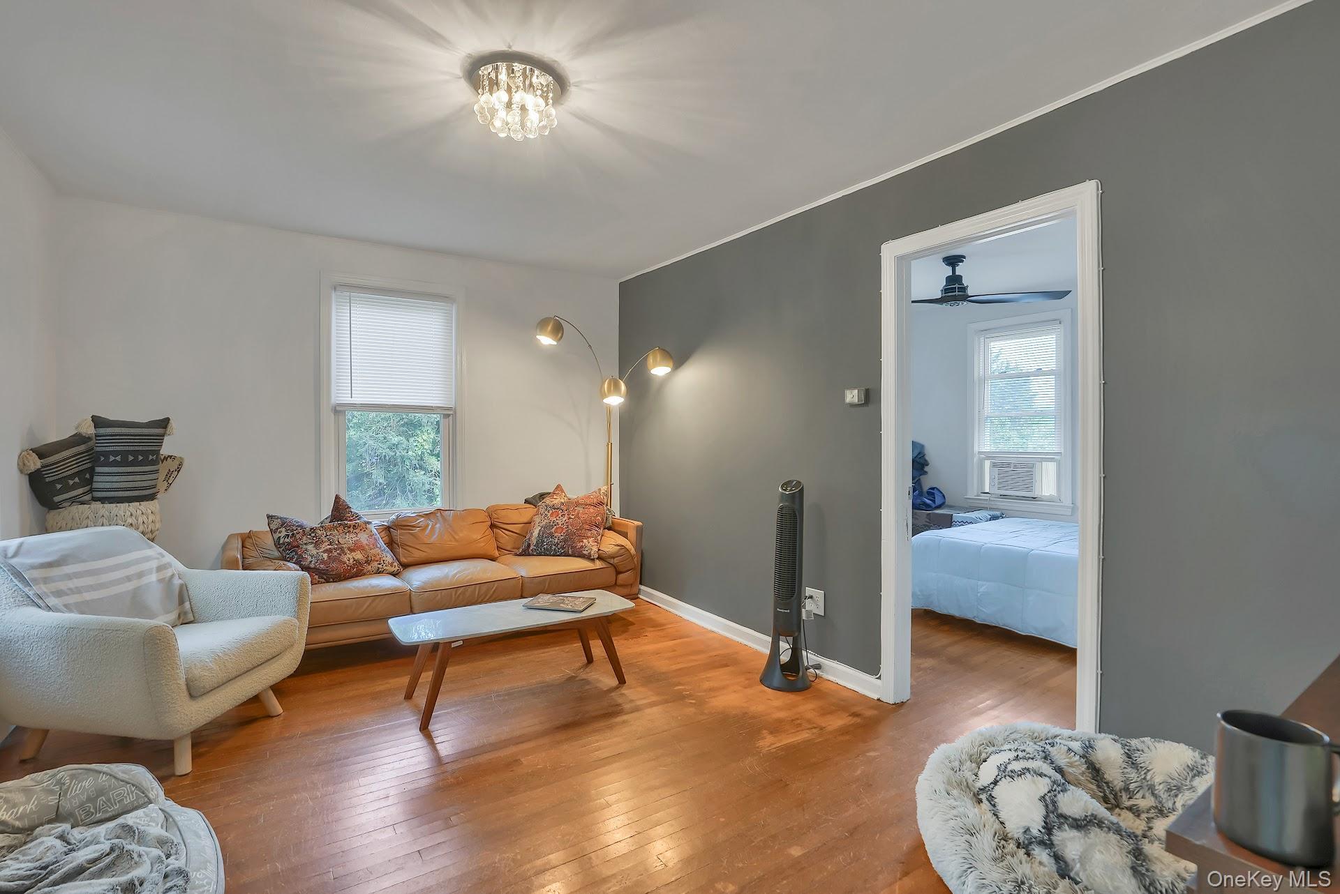 71 Greycourt Road Chester, NY 10918 - Photo 15 of 38 Living area featuring hardwood / wood-style floors, plenty of natural light, and ceiling fan