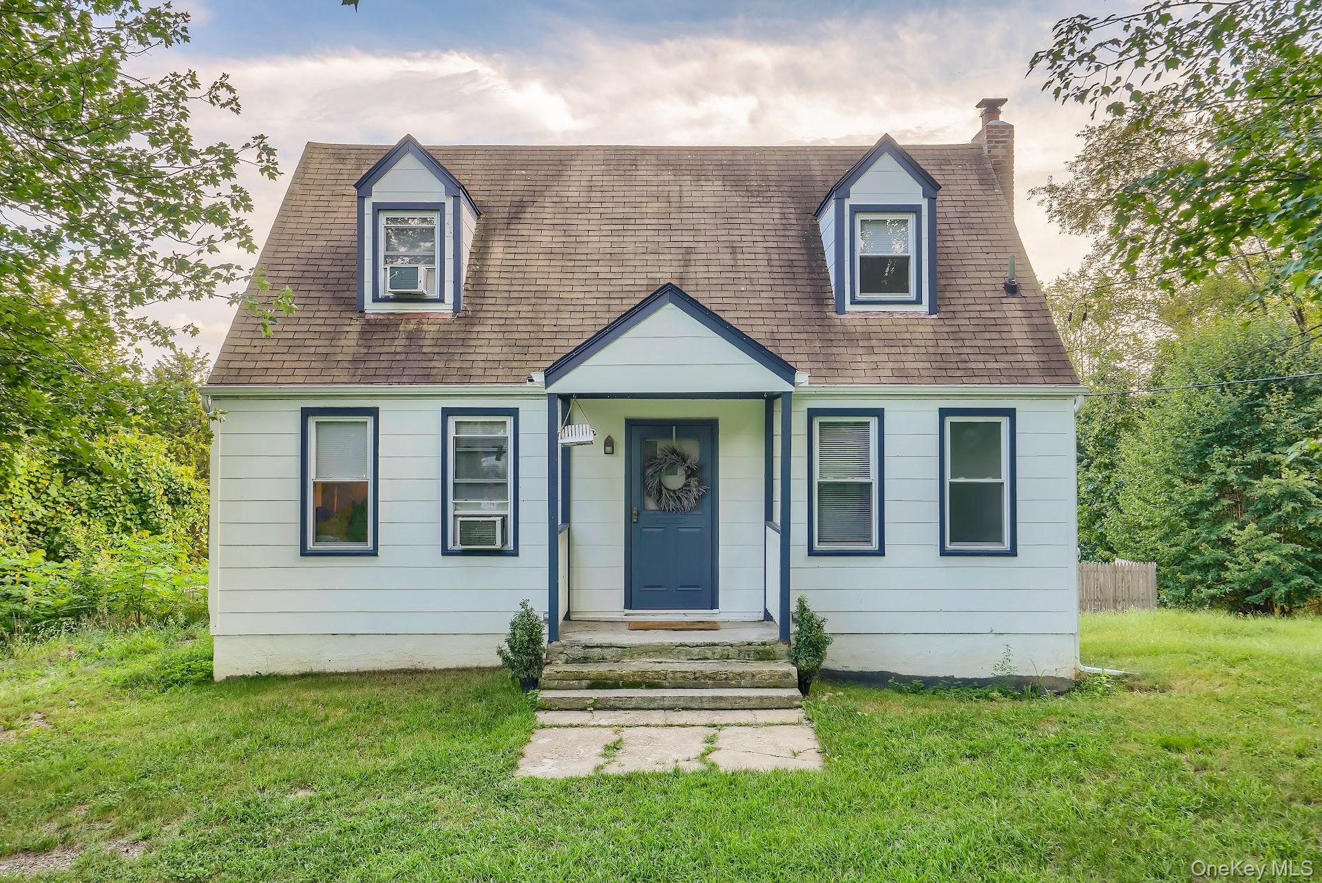 71 Greycourt Road Chester, NY 10918 - Photo 2 of 38 New england style home featuring a front lawn, a chimney, and a shingled roof