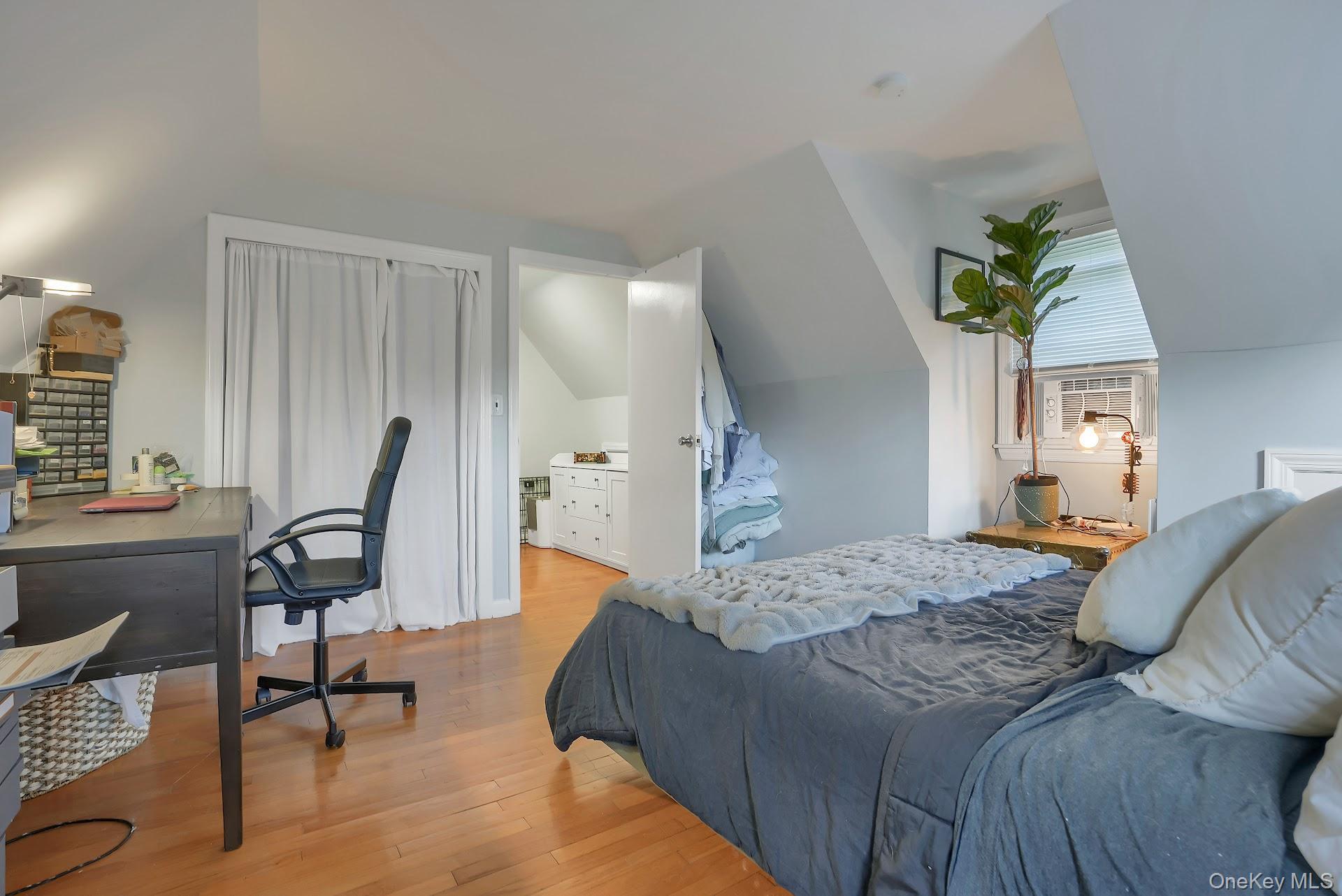 71 Greycourt Road Chester, NY 10918 - Photo 24 of 38 Bedroom featuring hardwood / wood-style floors, lofted ceiling, an office area, and cooling unit