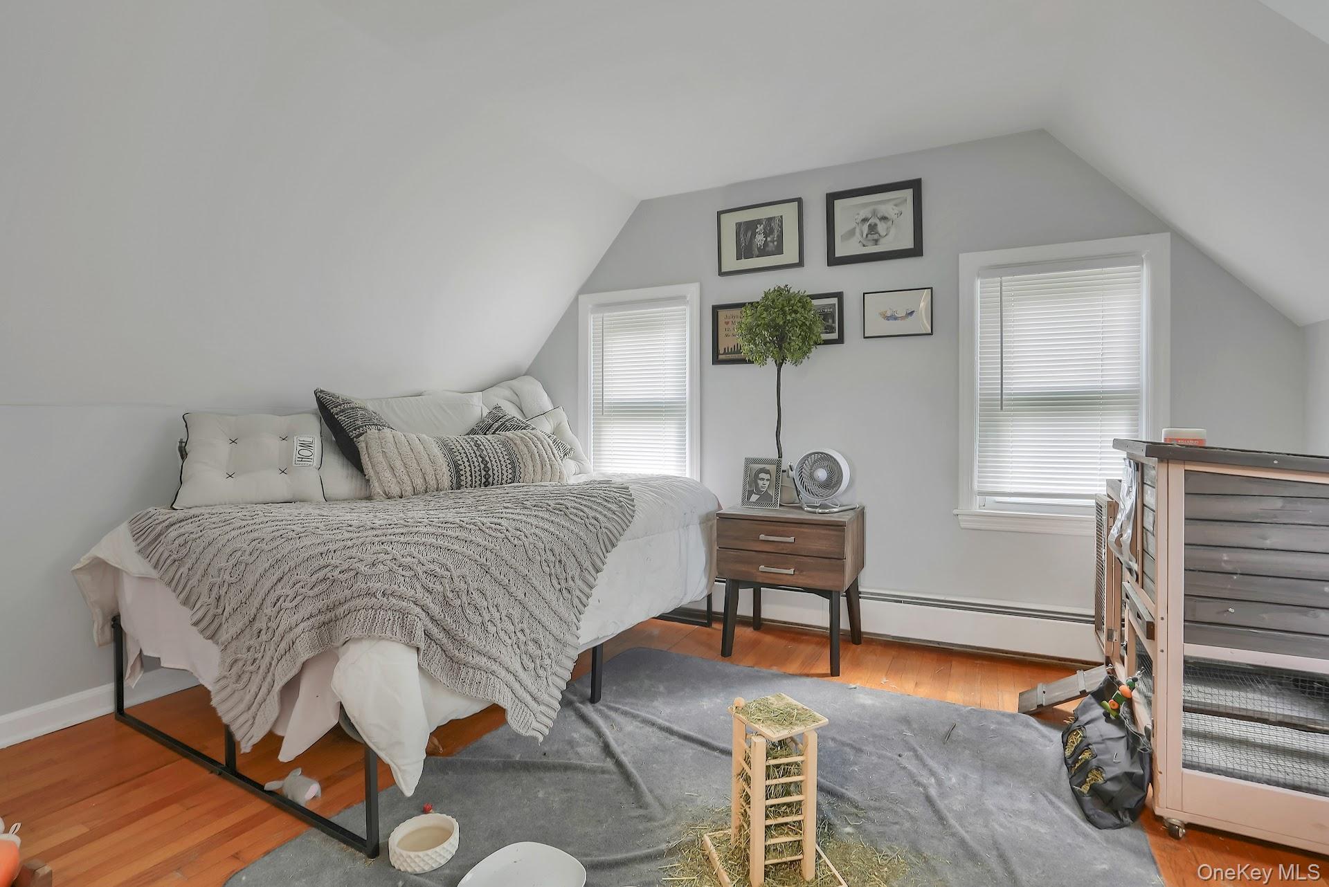 71 Greycourt Road Chester, NY 10918 - Photo 26 of 38 Bedroom featuring light wood-type flooring, vaulted ceiling, and baseboard heating