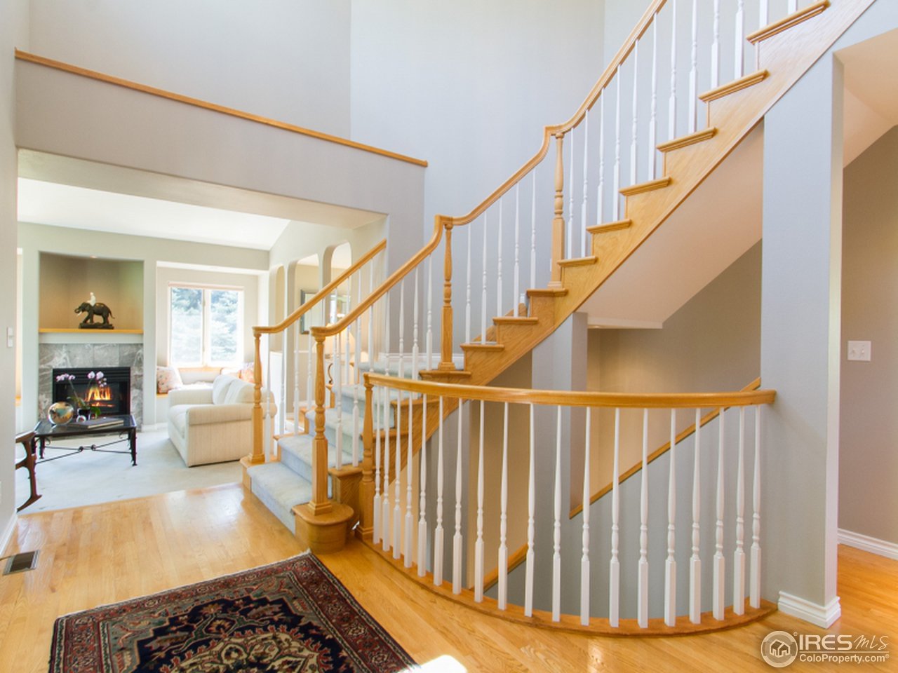 2512 Premier Place Boulder, CO 80304 - Photo 5 of 25 a view of entryway livingroom and hall with wooden floor