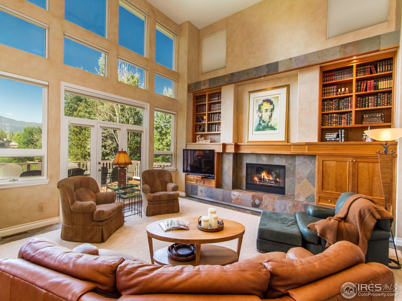 2512 Premier Place Boulder, CO 80304 - Photo 9 of 25 a outdoor living space with furniture and a large window