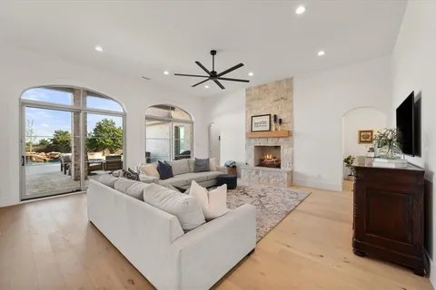 a kitchen with stainless steel appliances granite countertop a stove and a refrigerator