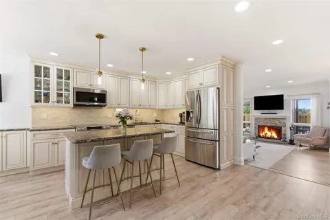 $965,000 | 67 Villas Circle, Melville, NY 11747