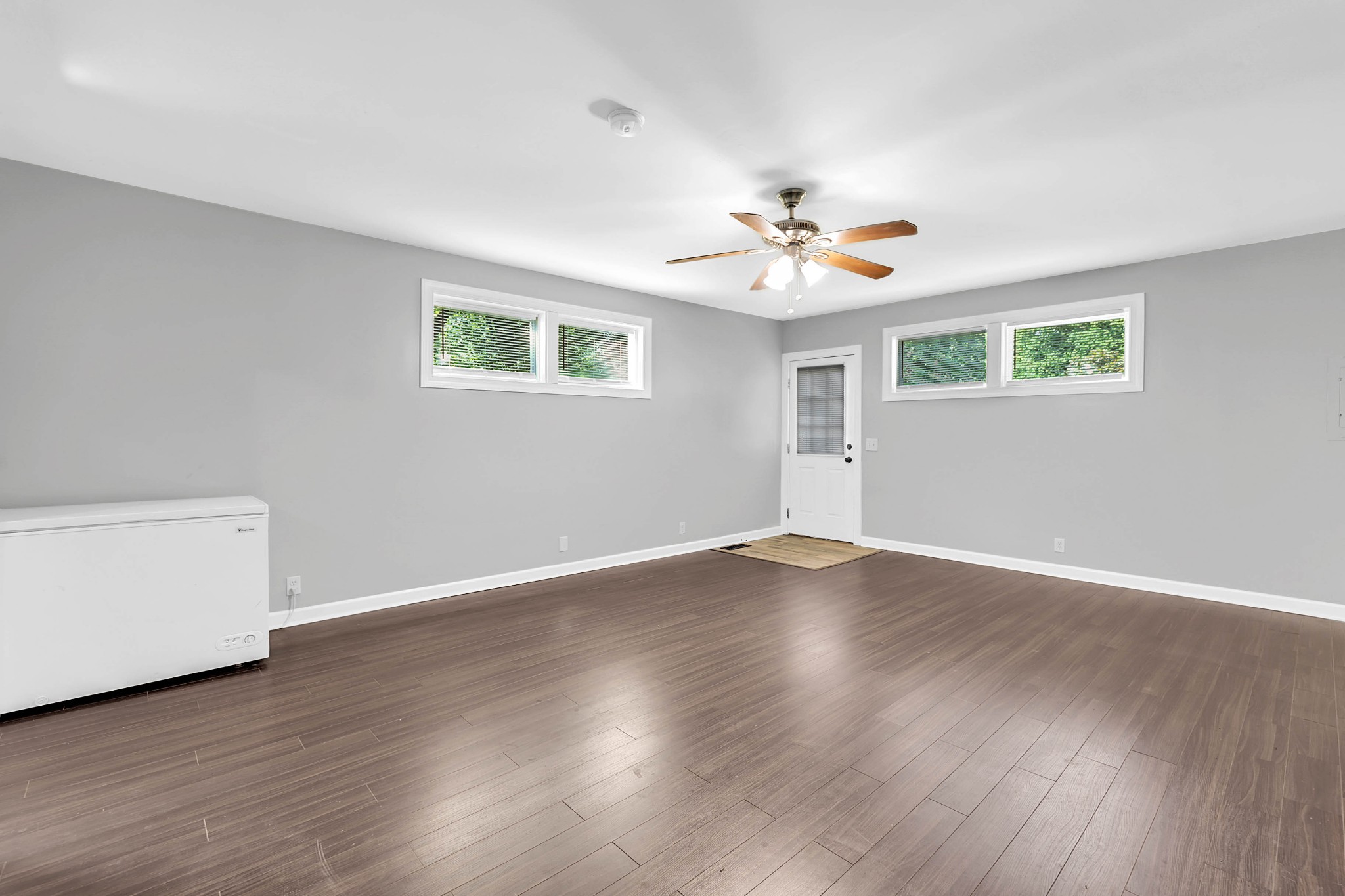 2812 Hastings Road Nashville, TN 37214 - Photo 14 of 32 a view of a room with wooden floor and a ceiling fan
