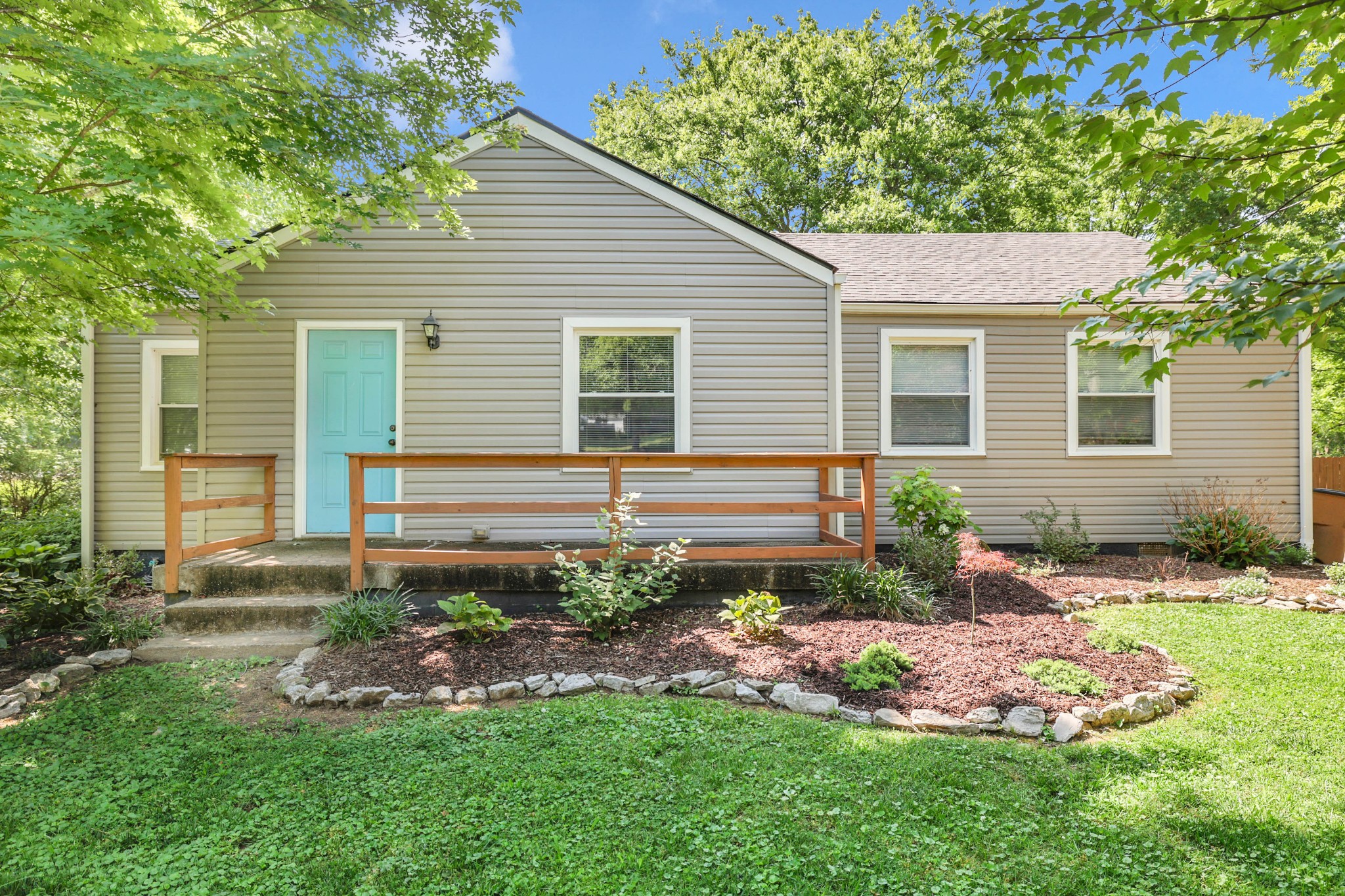 2812 Hastings Road Nashville, TN 37214 - Photo 2 of 32 a front view of a house with a garden