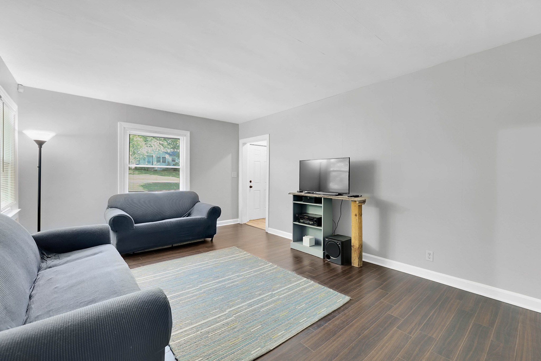 2812 Hastings Road Nashville, TN 37214 - Photo 6 of 32 a living room with furniture and a flat screen tv