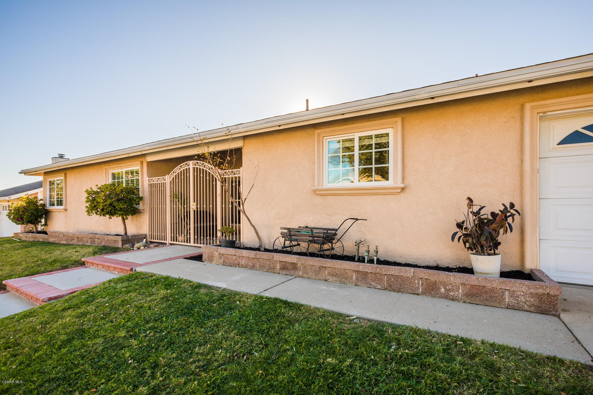 3441 Corpus Christi Street Simi Valley, CA 93063 - Photo 2 of 64 a backyard of a house with table and chairs