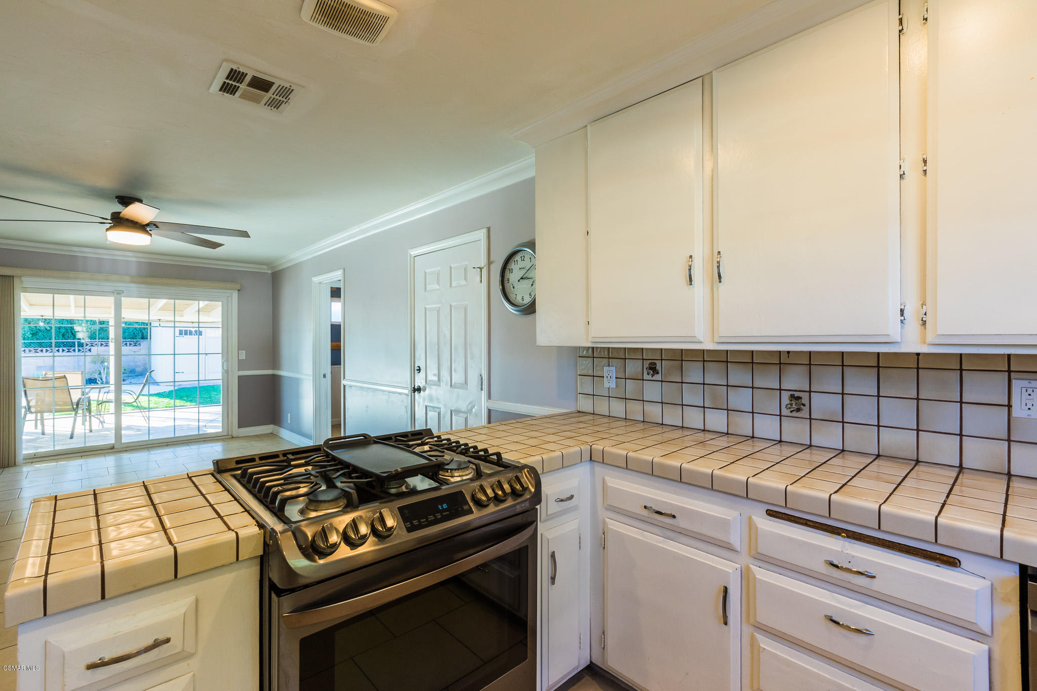 3441 Corpus Christi Street Simi Valley, CA 93063 - Photo 25 of 64 a kitchen with granite countertop a stove and a sink