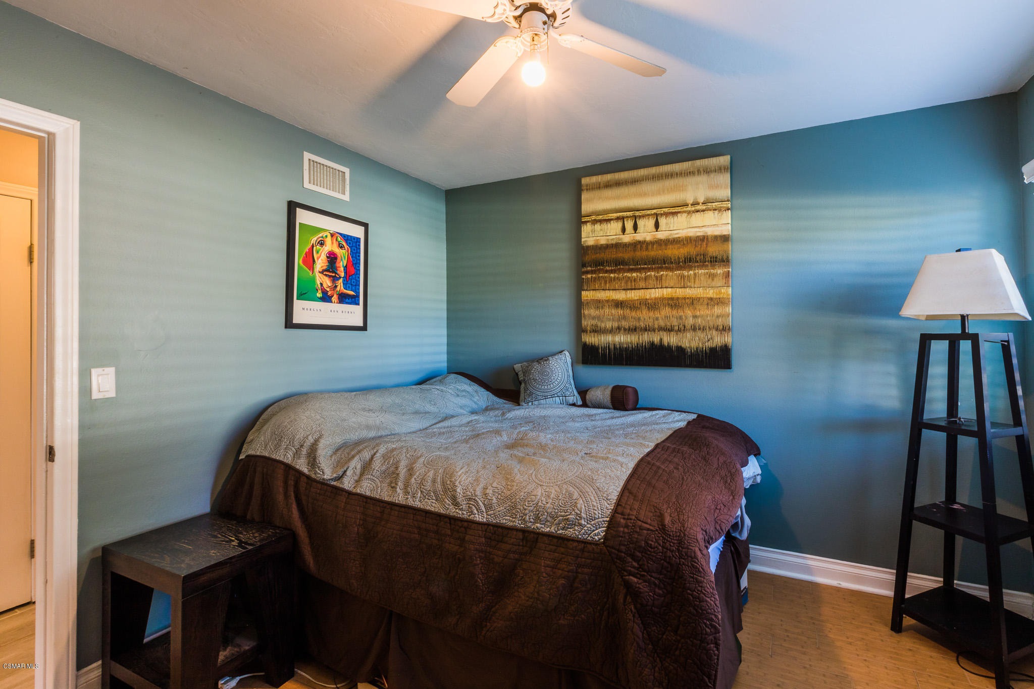 3441 Corpus Christi Street Simi Valley, CA 93063 - Photo 36 of 64 a bedroom with a bed wall painting and a window