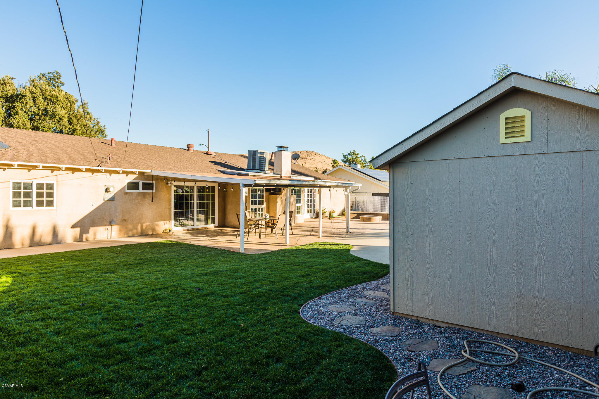 3441 Corpus Christi Street Simi Valley, CA 93063 - Photo 48 of 64 a front view of a house with a garden