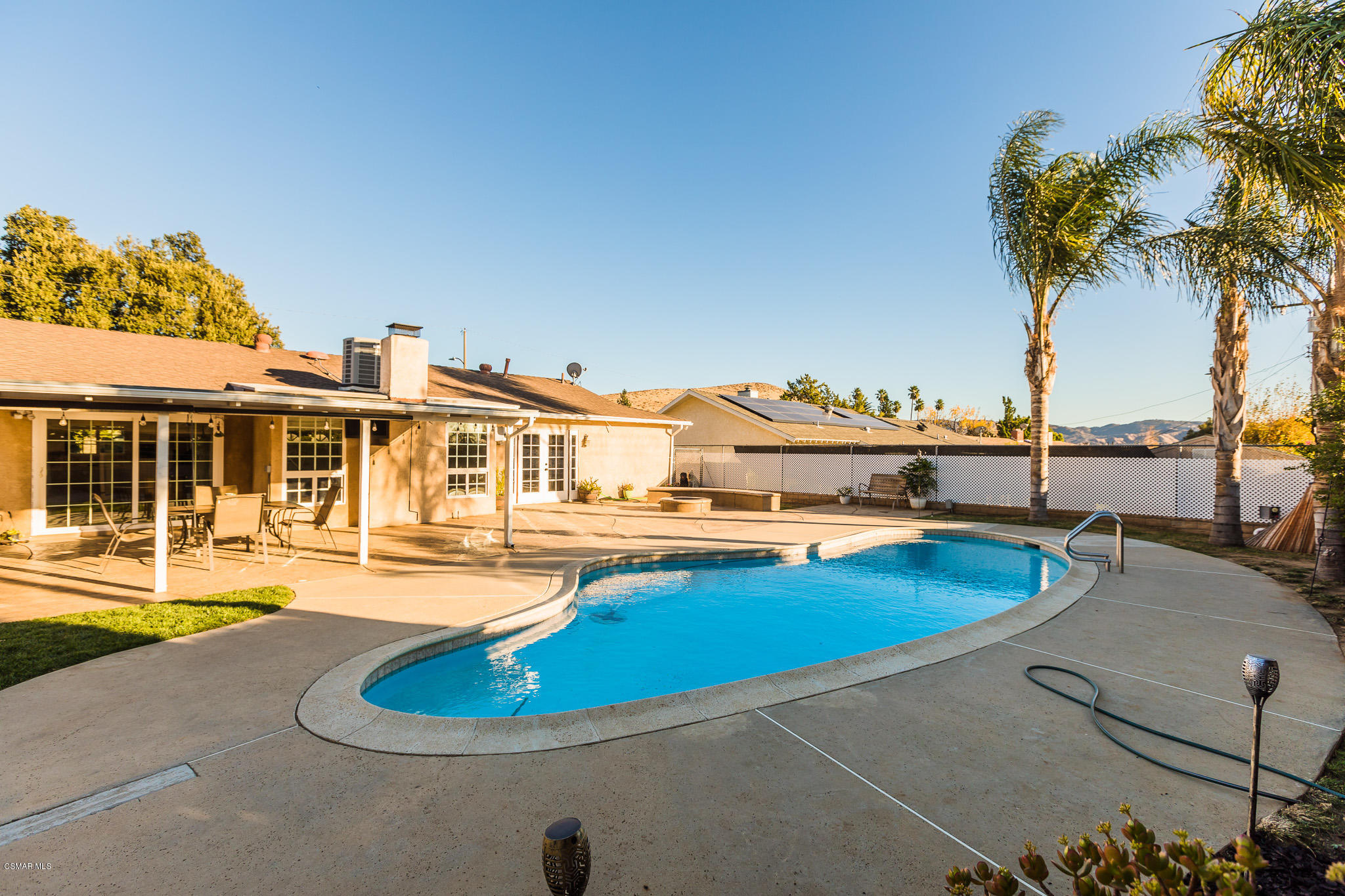 3441 Corpus Christi Street Simi Valley, CA 93063 - Photo 52 of 64 a view of a swimming pool with lounge chairs