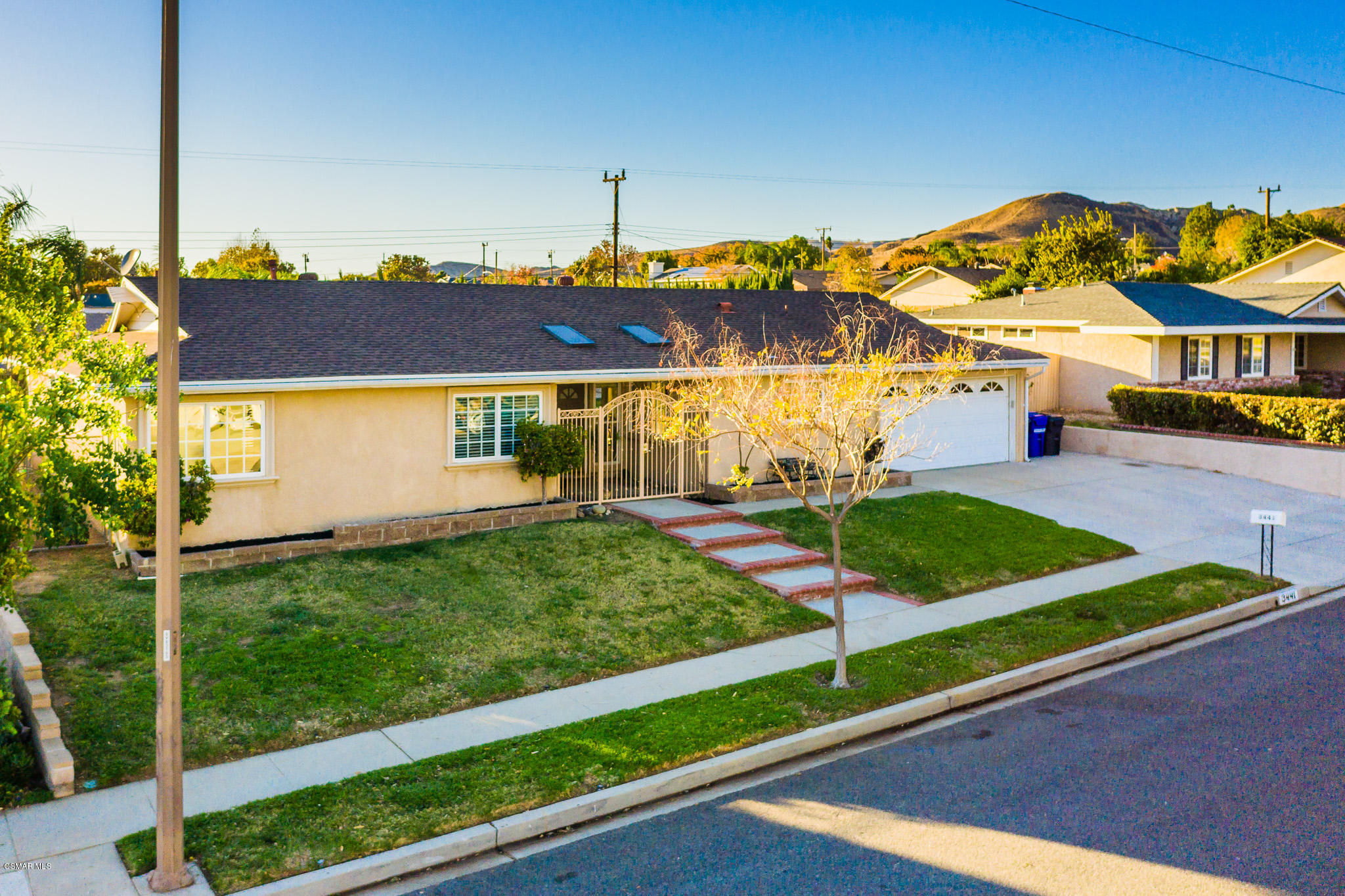 3441 Corpus Christi Street Simi Valley, CA 93063 - Photo 59 of 64 a view of a house with a big yard and potted plants