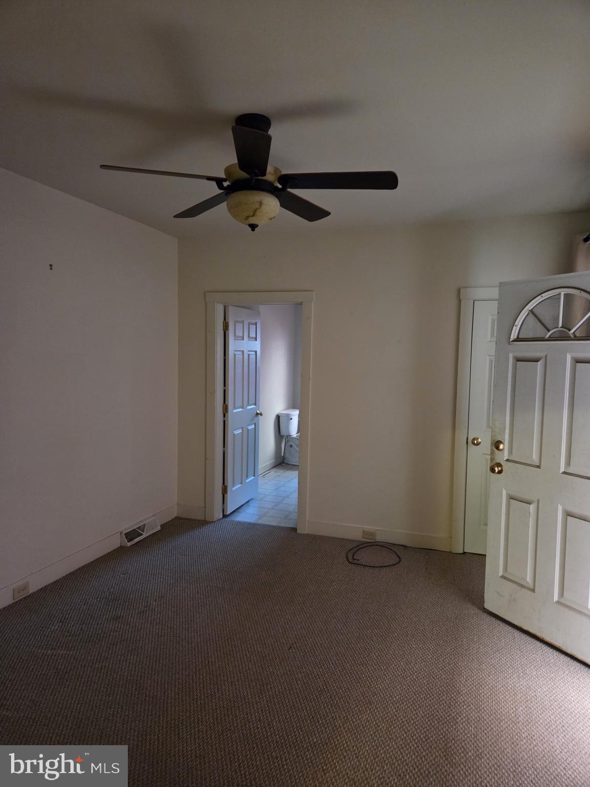 415 West King Street Lancaster, PA 17603 - Photo 17 of 18 an empty room with chandelier fan
