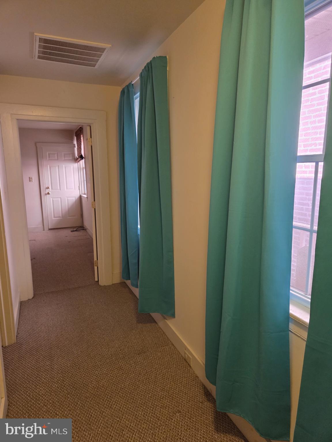 415 West King Street Lancaster, PA 17603 - Photo 9 of 18 a view of hallway with windows and stairs