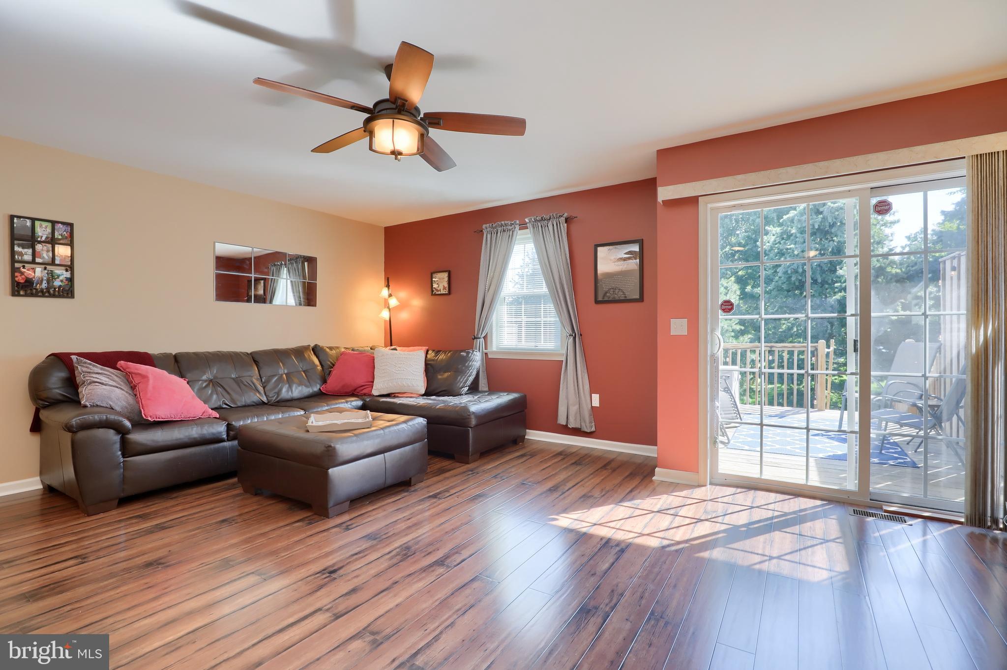 765 Keller Drive Lititz, PA 17543 - Photo 11 of 36 Alternate view of living room and back porch