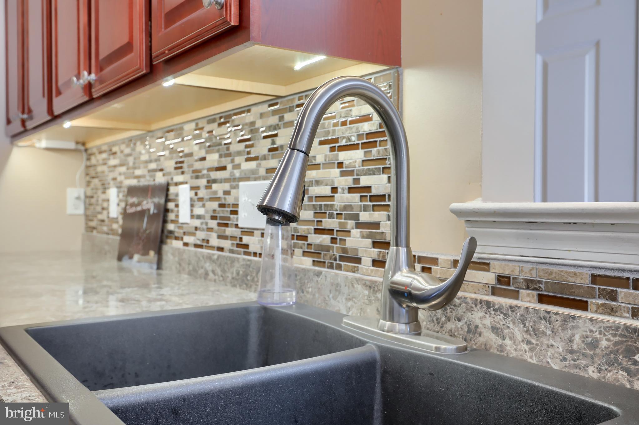 765 Keller Drive Lititz, PA 17543 - Photo 6 of 36 Love the sink and back splash in the kitchen!