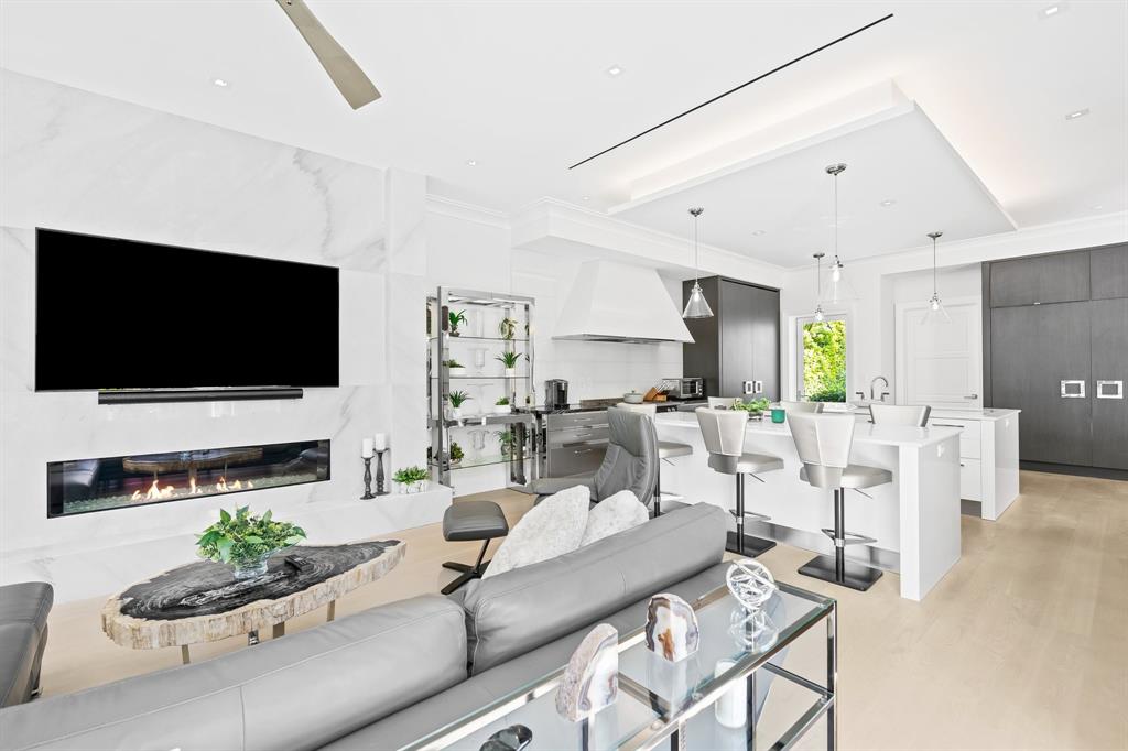 150 Kings Road Palm Beach, FL 33480 - Photo 13 of 45 a living room with furniture and a flat screen tv