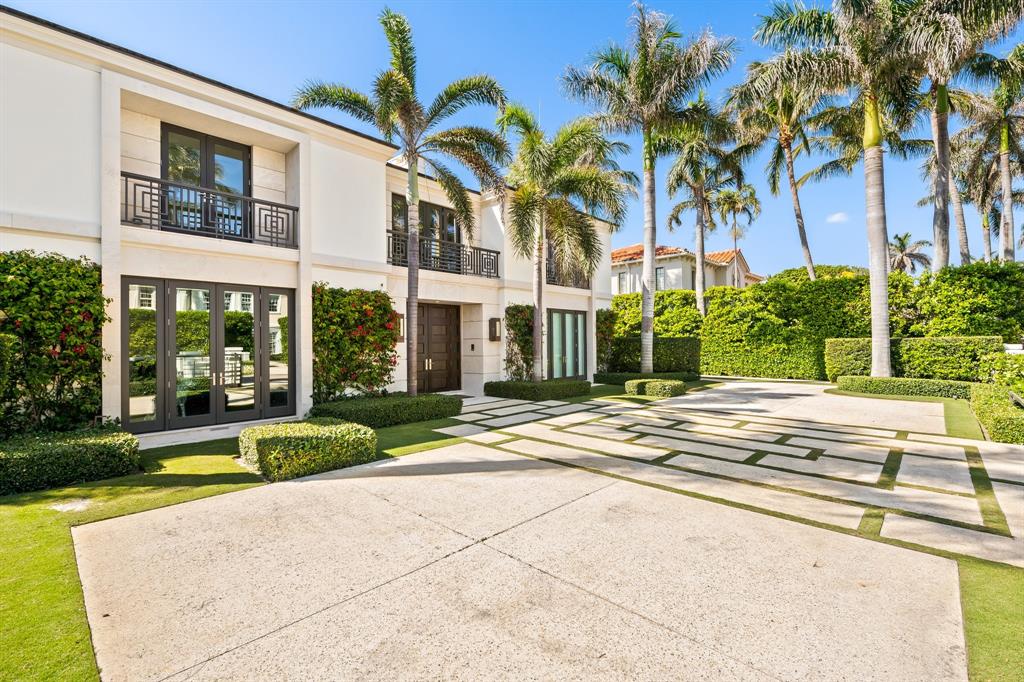 150 Kings Road Palm Beach, FL 33480 - Photo 2 of 45 a view of swimming pool with palm trees