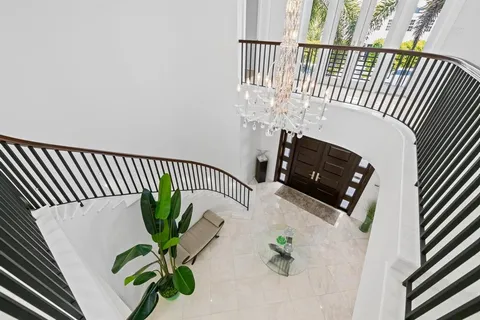 a spacious bedroom with a bed and a couch