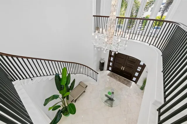 a spacious bedroom with a bed and a couch