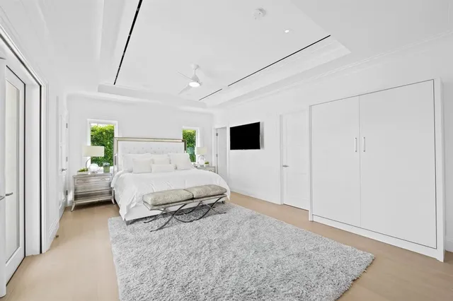 a bathroom with double vanity sink and a mirror
