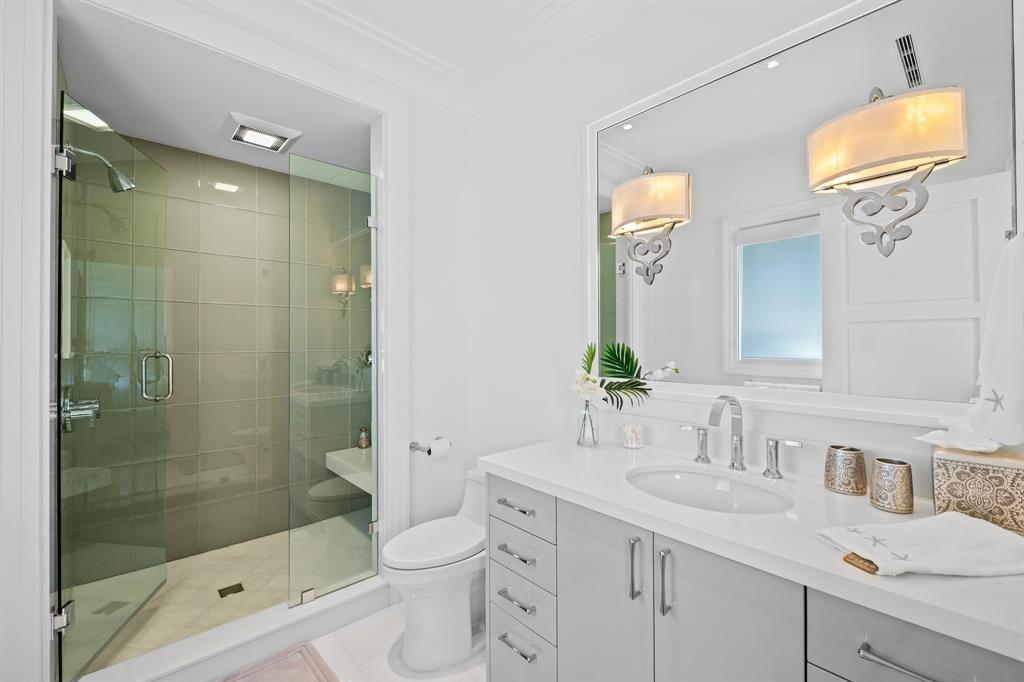 150 Kings Road Palm Beach, FL 33480 - Photo 26 of 45 a bathroom with a sink a toilet and shower