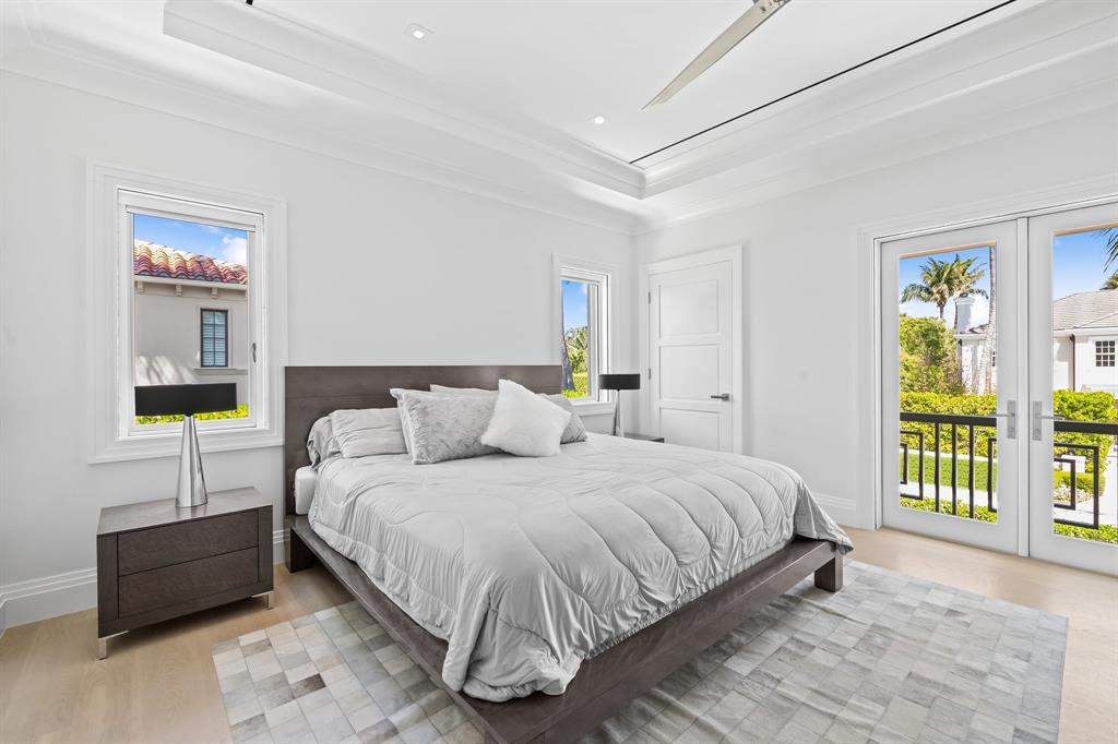 150 Kings Road Palm Beach, FL 33480 - Photo 27 of 45 a bedroom with a bed and a window