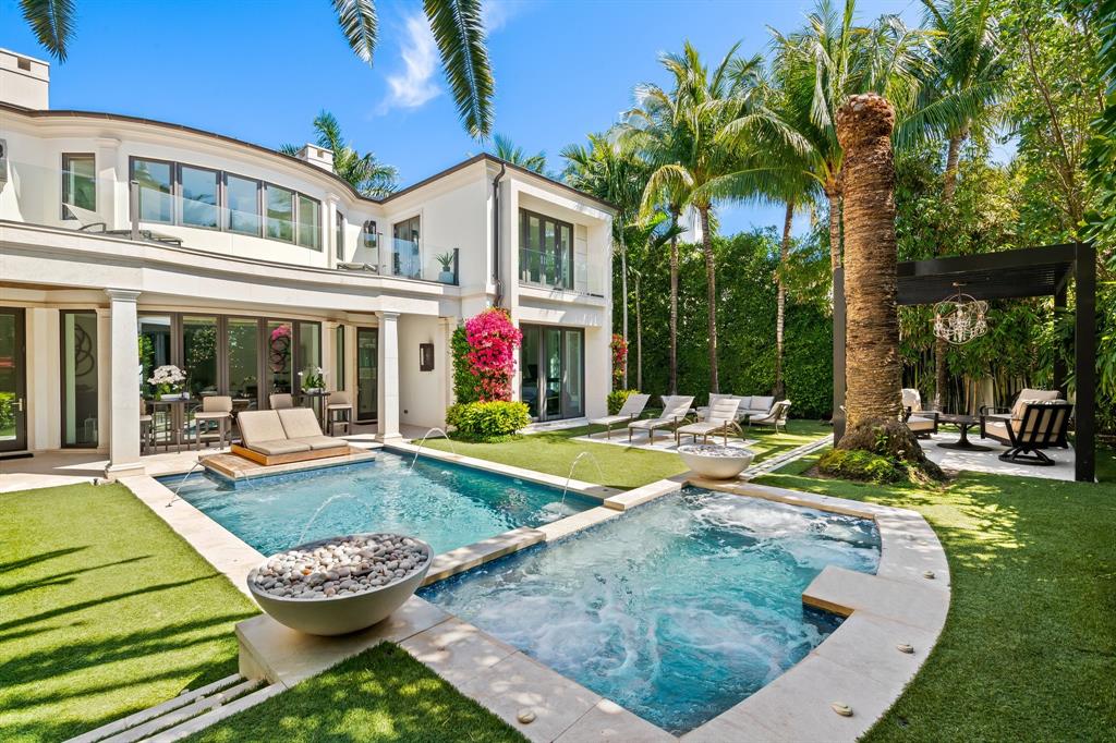 150 Kings Road Palm Beach, FL 33480 - Photo 42 of 45 a view of a patio with swimming pool table and chairs