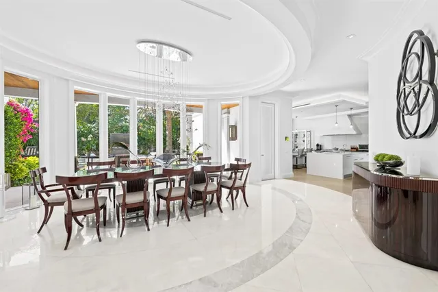 a kitchen with a stove and white cabinets