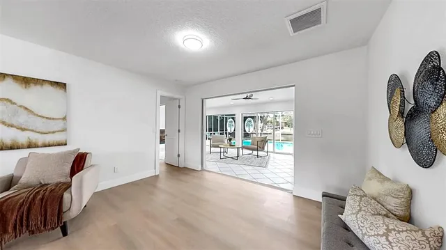 a living room with furniture and a table