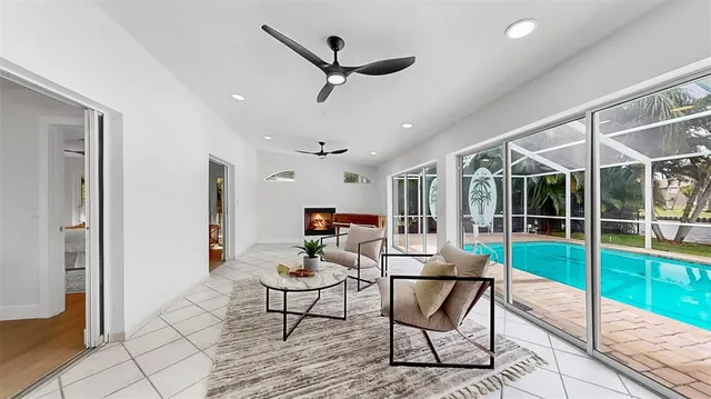 a living room with furniture and a lamp