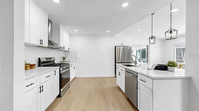 a view of swimming pool with a patio and a yard