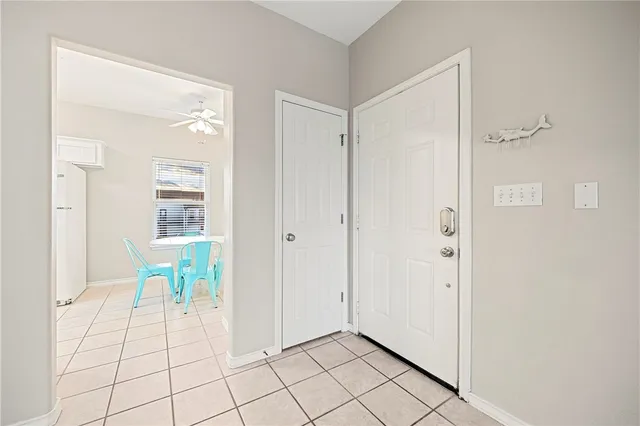 a view of an entryway with a chandelier