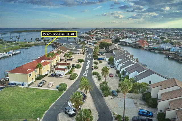an aerial view of a house with a garden